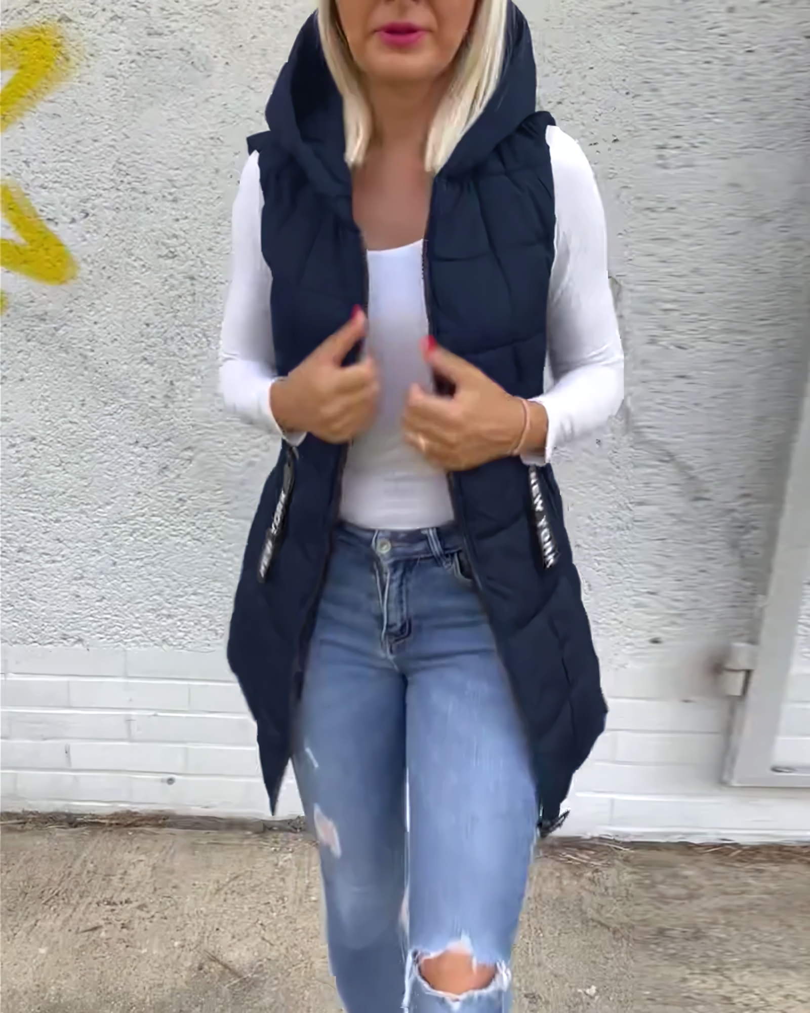 Adela Sleeveless Padded Coat - Warmth and Style in an Iconic Piece