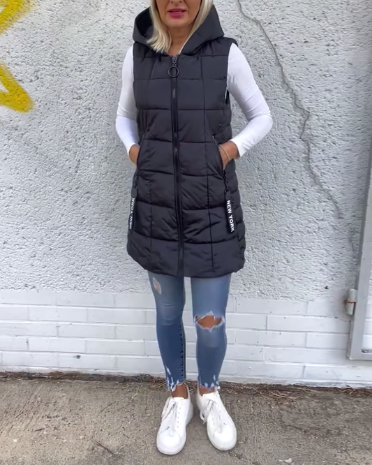 Adela Sleeveless Padded Coat - Warmth and Style in an Iconic Piece